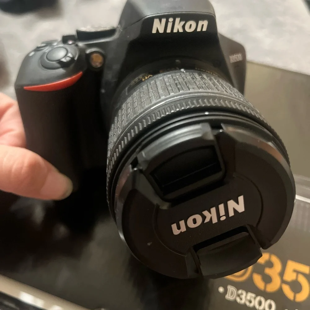 Nikon D3500 DSLR Camera with Black and Gold Accents
